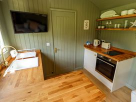 A kitchen with a sink and appliances at Primrose in Grimsby