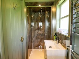 A bathroom with a shower and sink at Primrose in Grimsby
