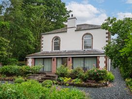 A house with a garden and pathway at The School in Mungrisdale near Caldbeck