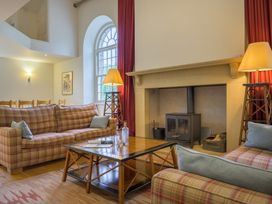 A living room with sofas and a coffee table at The School in Mungrisdale near Caldbeck