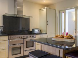 A kitchen with an oven and a toaster at The School in Mungrisdale near Caldbeck