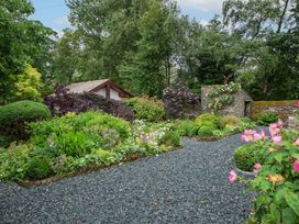 A garden with various plants and flowers at The School in Mungrisdale near Caldbeck
