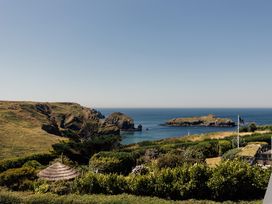 A coastal view with cliffs and islands at Trevean in Mullion