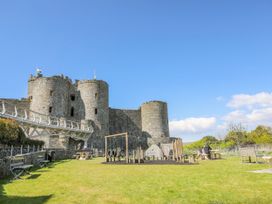 An outdoor area with a castle and playground at Tirionfa Talsarnau