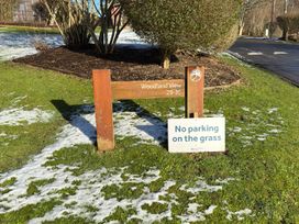 A sign indicating Wood and View 29-35 and no parking on the grass at Woodland View 31 - The Hawthorns Finlakes Holiday Park near Chudleigh