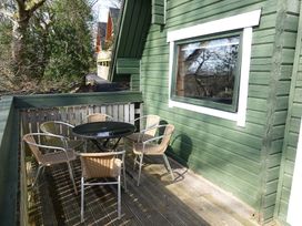 An outdoor area with a table and chairs at Tor View Finlakes Holiday Park near Chudleigh