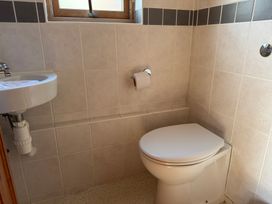 A bathroom with a sink and a toilet at Tor View Finlakes Holiday Park near Chudleigh