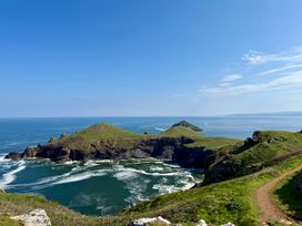 A coastal view with islands and ocean at Glendale Trelights near Port Isaac
