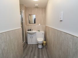 A bathroom with a sink and toilet at The Newborough Apartment 1 Scarborough