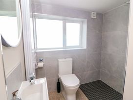 A bathroom with a toilet and sink at Valley View House in Kealkill, County Cork