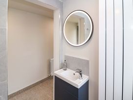 A bathroom with a sink and mirror at Valley View House, Kealkill, County Cork