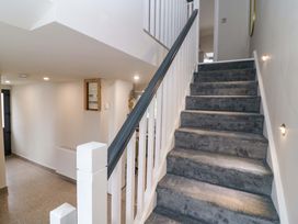 A staircase with carpeted steps at Valley View House in Kealkill, County Cork