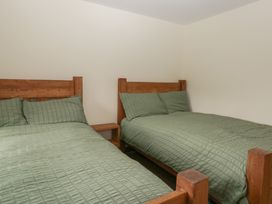 A bedroom with two beds in Howgill Head Kendal