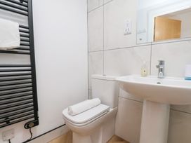 A bathroom with a sink and toilet at Belle's View in Scarborough