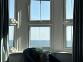 A living room with a view of the sea at Belle's View in Scarborough