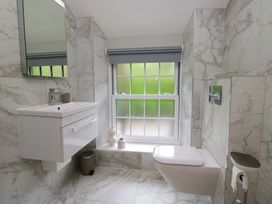 A bathroom with a sink and toilet at Dove Cottage in Ambleside