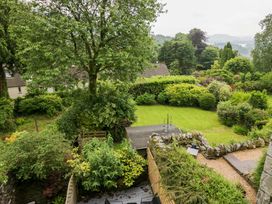 A garden view with greenery at Dove Cottage in Ambleside