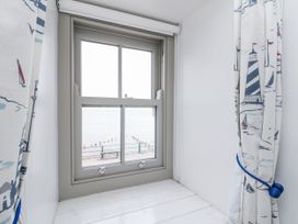 A window with view of the water at Shelstone in Whitby