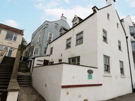A view of buildings with a staircase at Shelstone in Whitby