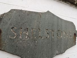 A sign reading SHELSTONE at the property Shelstone in Whitby