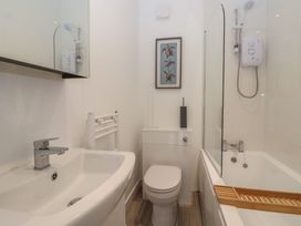 A bathroom with a sink and toilet at Birch Cottage Scarborough
