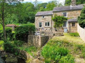 A house with an outdoor area and steps at Whinstone Cottage Esk Valley near Grosmont