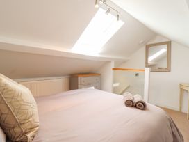 A bedroom with bed and furniture at 3 Rosemary Lane in Conwy