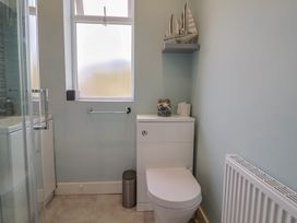 A bathroom with a toilet and shower at 7 Cedar Drive Preston