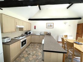 A kitchen with cabinets and countertop at Beechwood in Wood Norton near Foulsham
