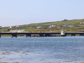 A view of a bridge with nearby houses at O'Conells in Portmagee
