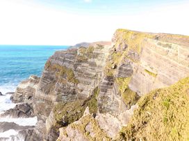 A view of cliffs overlooking the ocean at O'Conells in Portmagee