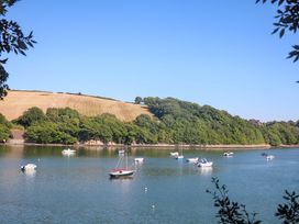 A view of boats on water with hills and trees in the background at 61B Fore Street in Kingsbridge