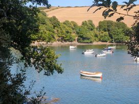 A view of boats on water surrounded by trees at 61B Fore Street in Kingsbridge