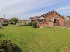A house with a garden and pathway at 3 Hawk Place near Moresby Parks near Whitehaven