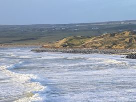 A shoreline with waves and rocks at Teach Ti in Miltown Malbay
