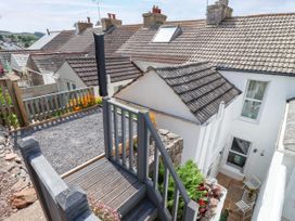 An outdoor area with stairs and a flower bed at 45 North View Brixham