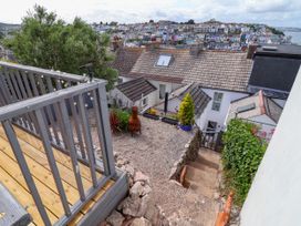 An outdoor area with steps and a view of houses in Brixham at 45 North View