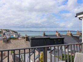 A view of rooftops and the sea at 45 North View in Brixham
