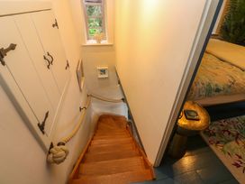 A staircase leading to a bedroom at Mermaid Cottage in Coverack near St Keverne