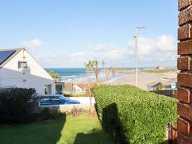 A view of the sea and beach from a property at Pipers Newquay