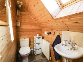 A bathroom with a sink and toilet at Dan Y Coed Beggar's Bush near Presteigne