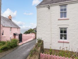 Exterior view of houses and pathway at Penwyn in Solva