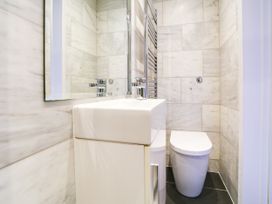 A bathroom featuring a sink and toilet at Church Hill House, Port Isaac
