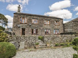 A house with windows and a door at The Barn at Grasmere in Grasmere