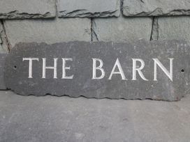 A slate sign with the text 'THE BARN' at The Barn at Grasmere Grasmere
