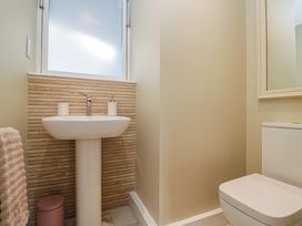 A bathroom with a sink and toilet at The Barn at Grasmere