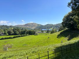 A landscape view with fields and hills at The Barn at Grasmere in Grasmere
