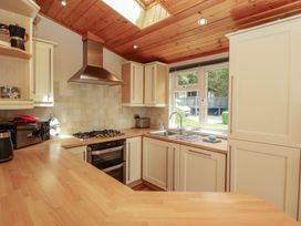 A kitchen with countertop and appliances at 28 Troutbeck in Bassenthwaite