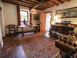 An indoor office with a table and chairs at Chapel Cottage in Ennerdale near Cleator Moor