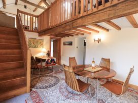 A dining room with a table and chairs at Chapel Cottage Ennerdale near Cleator Moor